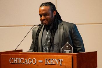 Christopher Lazare ’25 accepts the 2025 Dean’s Exemplary Public Service Award